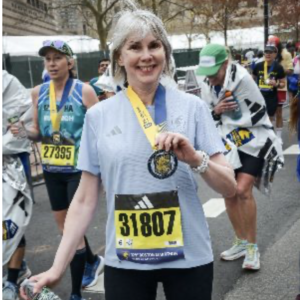 Suzanne of Spoicer & Co finsihing the Boston Marathon